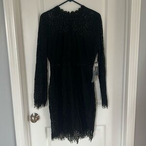 Black long sleeve lace form fitting dress